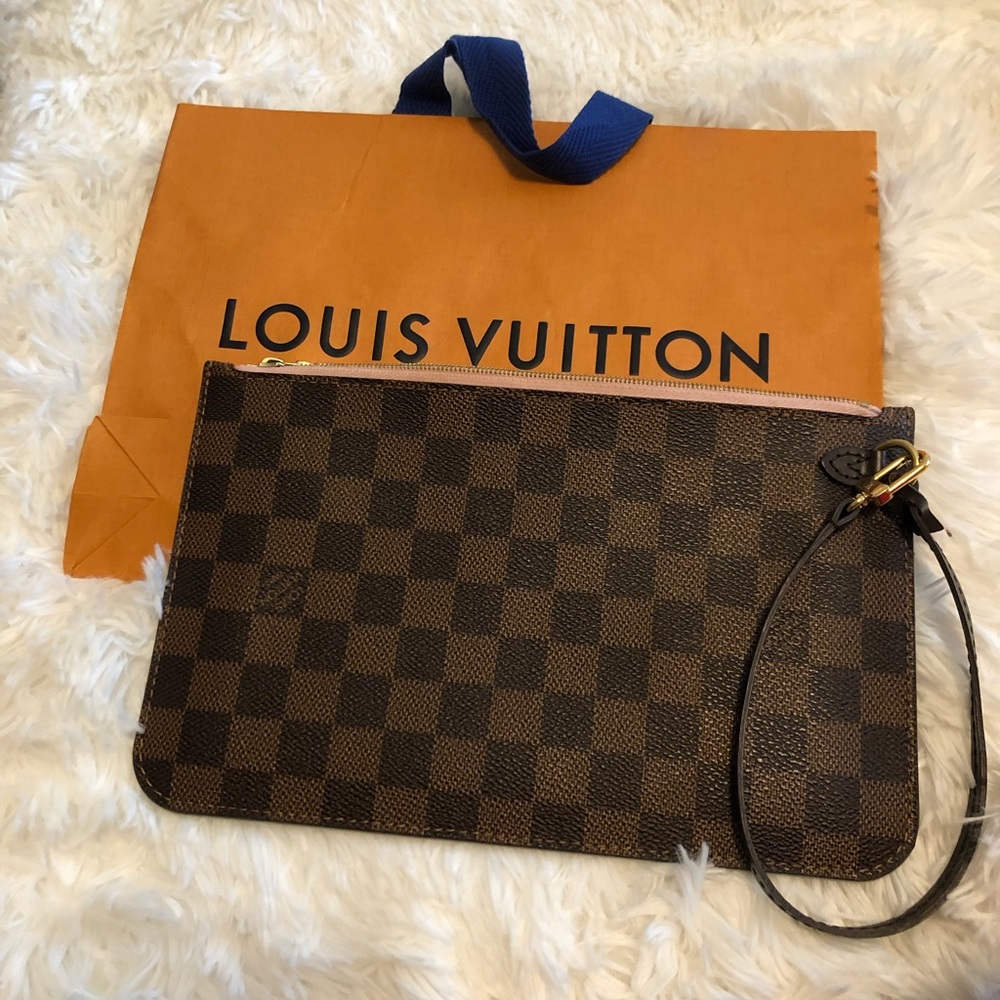 Sold Damier ebene neverfull mm pouch